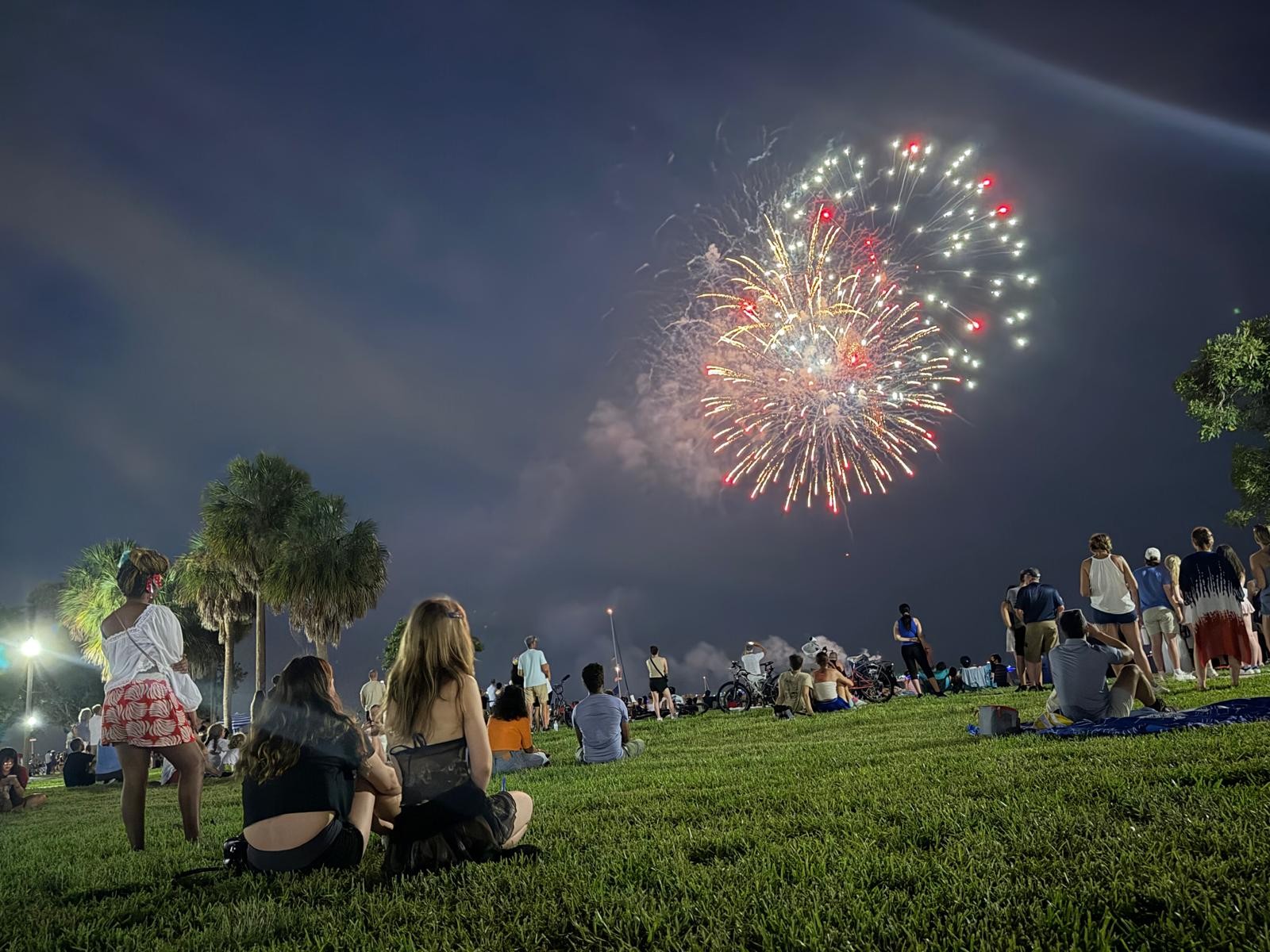 Fireworks over the crowd at the downtown St. Petersburg Fourth of July celebration
